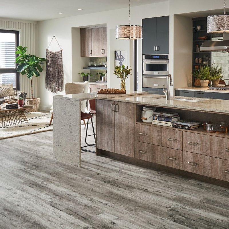 modern kitchen and living room filled with furniture